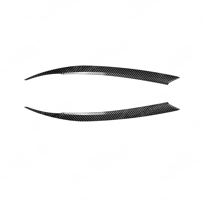 Detailed view of the carbon fiber textured finish on the Subaru Impreza headlight eyelids