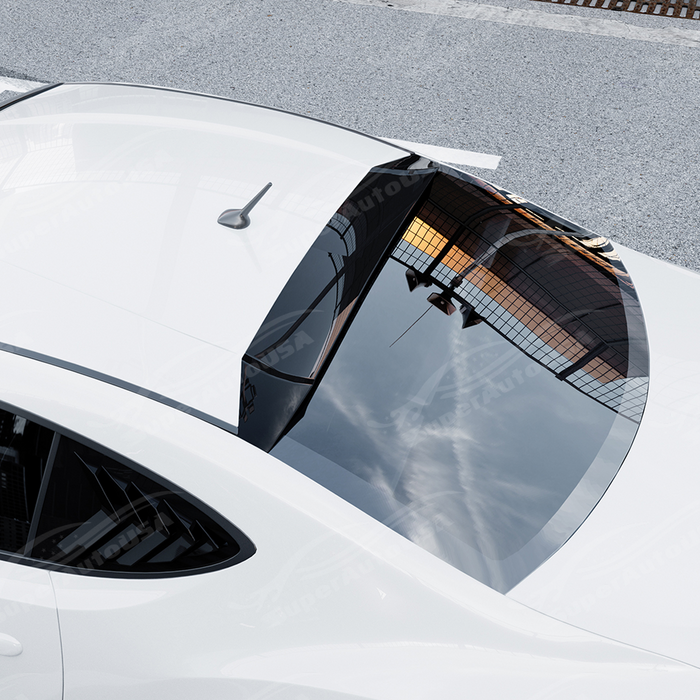 Top-down view highlighting the sleek aerodynamic curvature of the gloss black roof visor