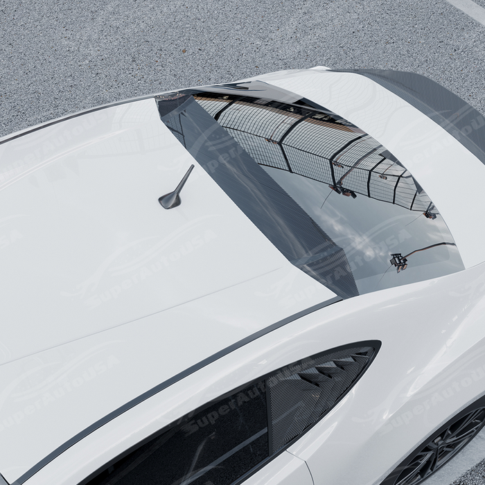 Top-down view highlighting the sleek aerodynamic curvature of the Carbon Print roof visor