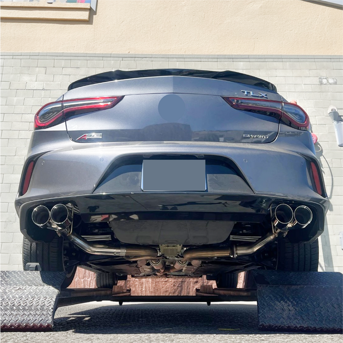Close-up of the quad exhaust tips on the Acura TLX muffler delete