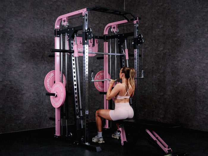 Gym Plus Double Hook EZ Curl Bar Cable Attachment CABLE-CURLBAR a woman performing pulldown in front of Icon functional trainer
